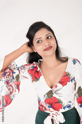 Pretty young female posing on white background