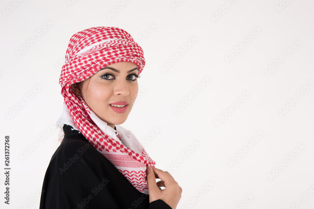 pretty young Arab female in traditional dress posing on white background pretty young Arab female in traditional dress posing on white background