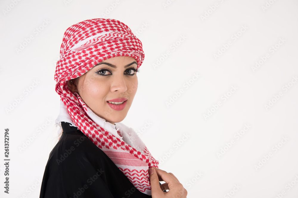 pretty young Arab female in traditional dress posing on white background pretty young Arab female in traditional dress posing on white background