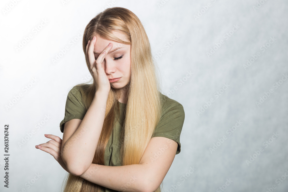 Portrait of a young woman having stress, problems at work.