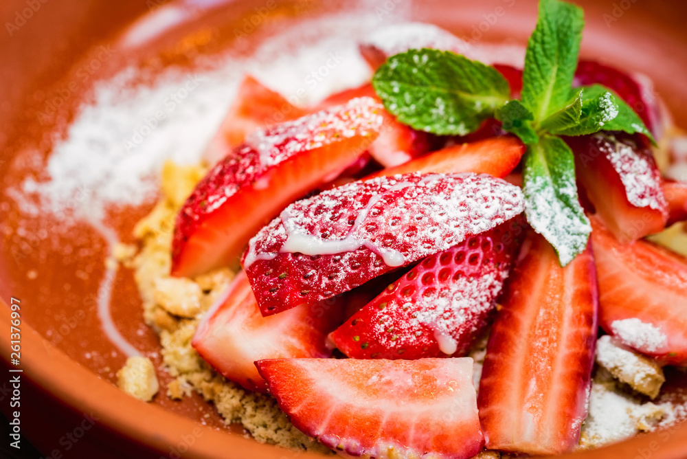 Close up strawberry dessert with cookie crumbles Close up strawberry dessert with cookie crumbles