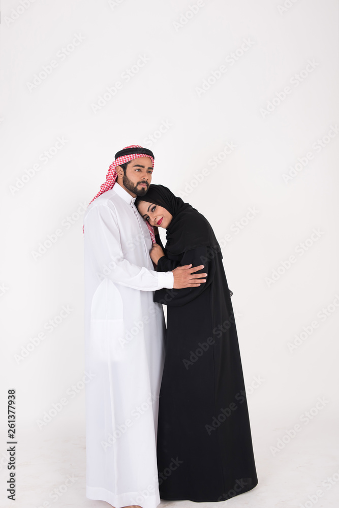 Arab Couple in traditional dress on white background