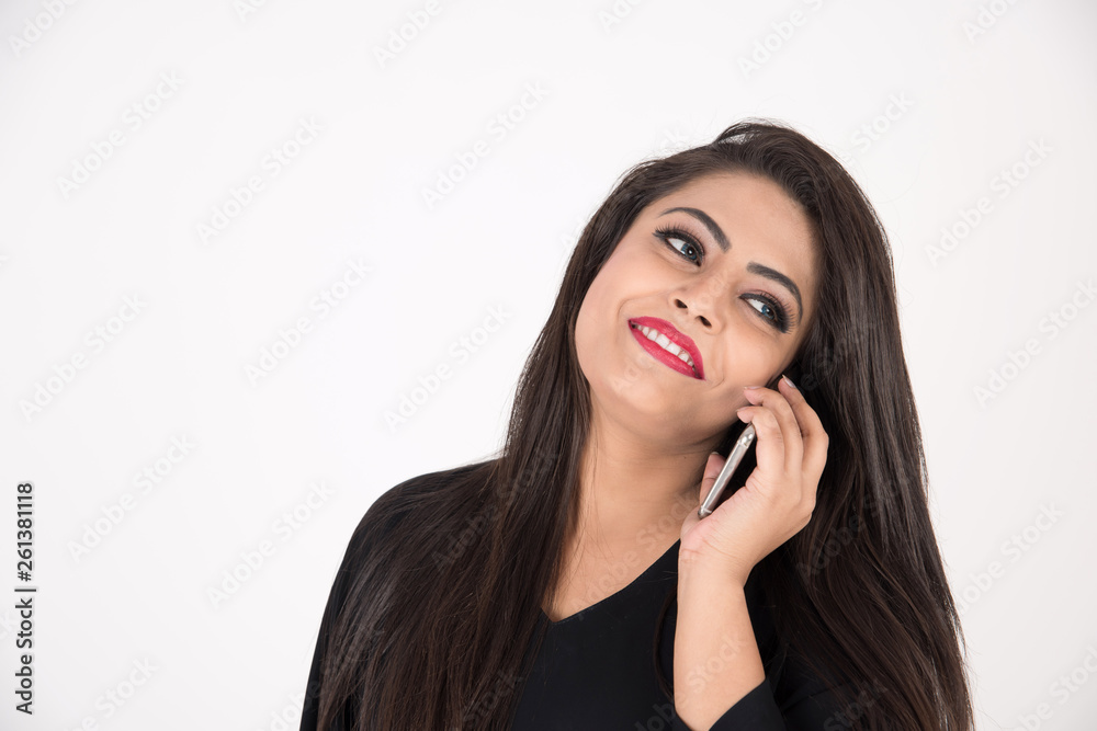 Arab woman in traditional dress using cell phone on white background Arab woman in traditional dress using cell phone on white background