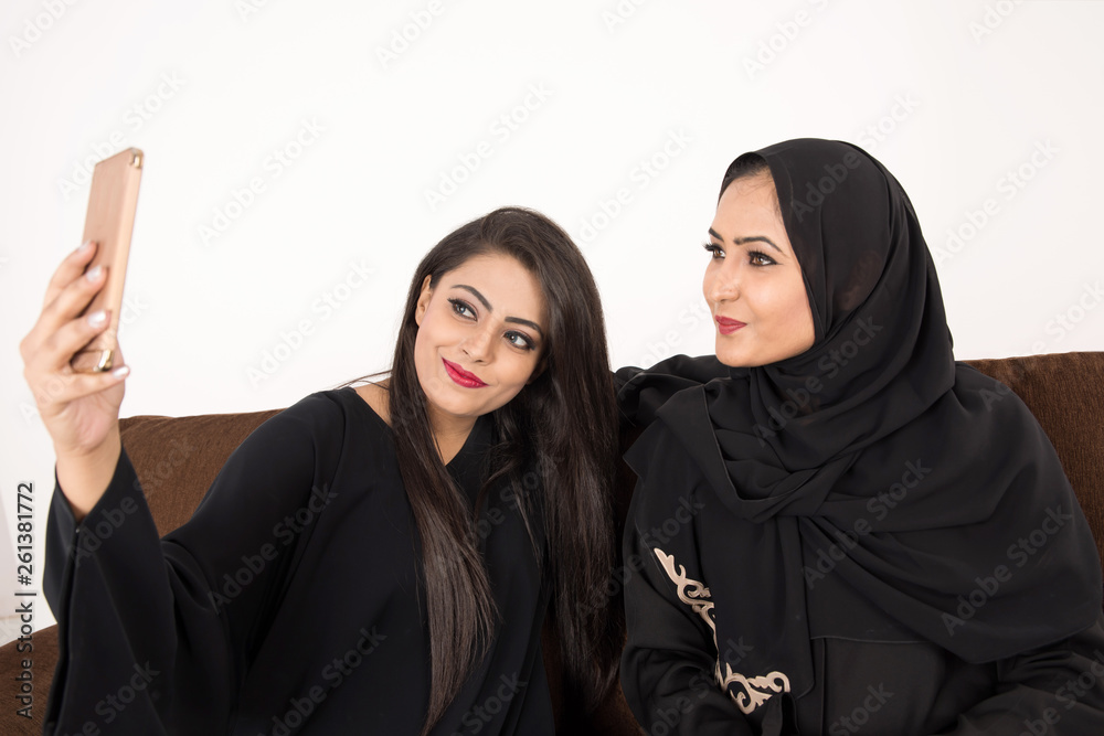 Arab Females sitting at home enjoying the time Arab Females sitting at home enjoying the time