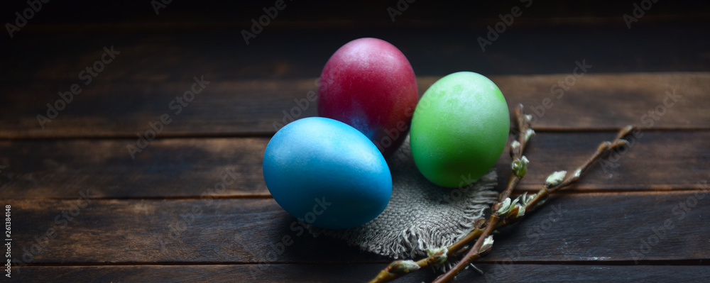 Obraz premium painted Easter eggs on wooden background