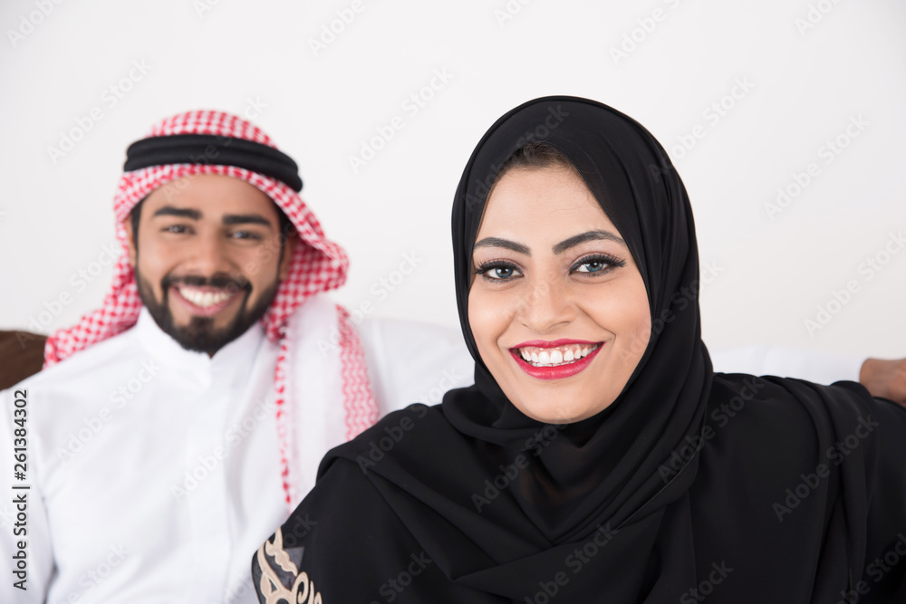 Arab couple sitting at home