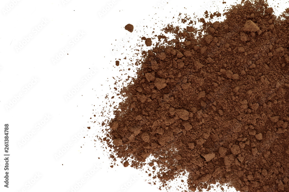 Pile of fresh ground coffee powder isolated on white. Pile of fresh ground coffee powder isolated on white.