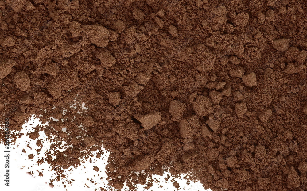 Pile of fresh ground coffee powder isolated on white. Pile of fresh ground coffee powder isolated on white.