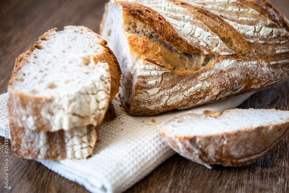 Homemade healthy freshly baked organic whole grain unleavened bread on wooden table