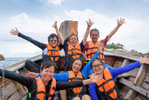 Traveler group that are large family enjoy on the boat