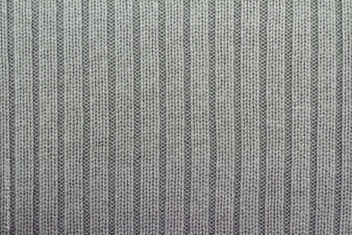 Gray knitting background vertical columns hobby strings free time knitting