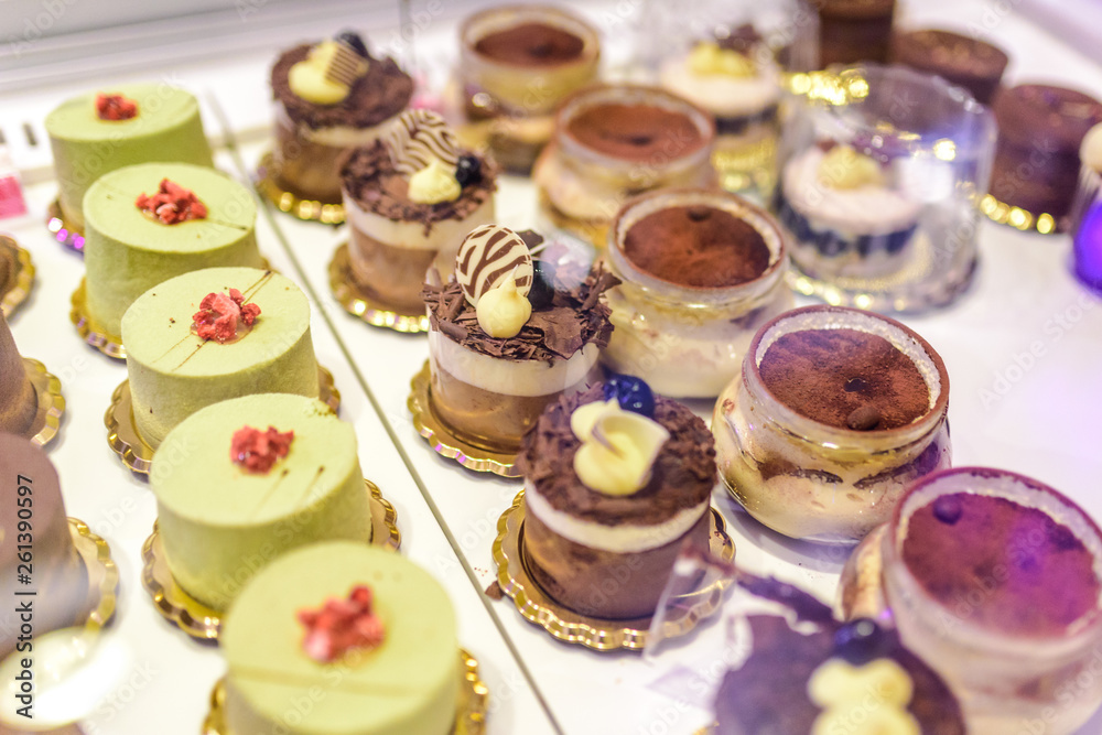 Variety of small cakes / dessert in a pastry shop