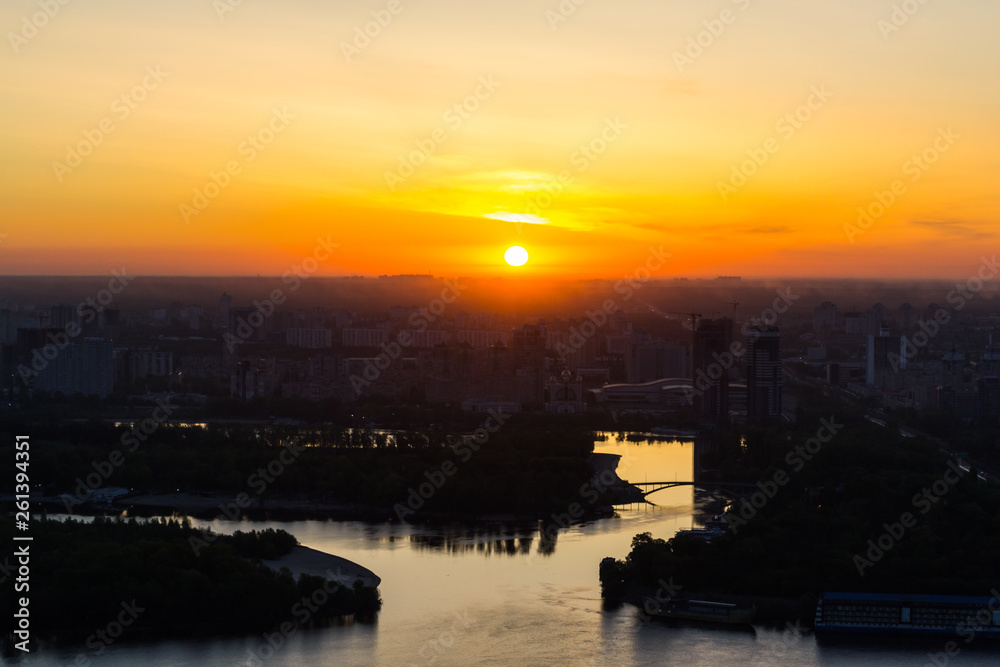 sunrise over the picturesque river in the city