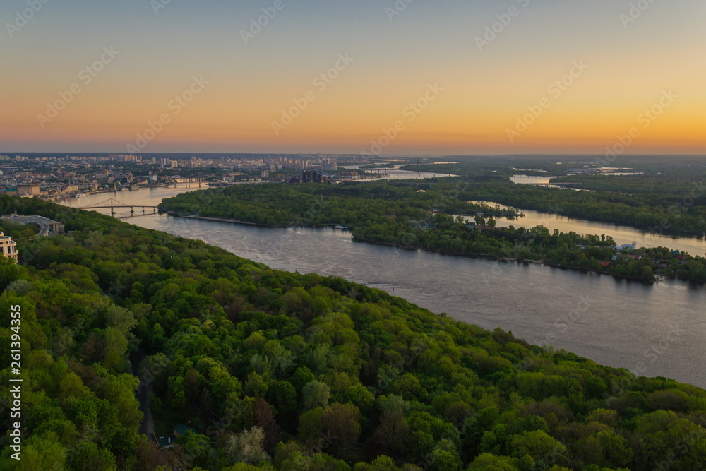 sunrise over the picturesque river in the city