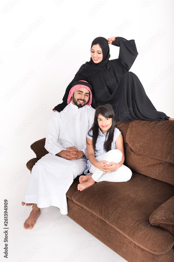 Arab Family sitting at home enjoying the time