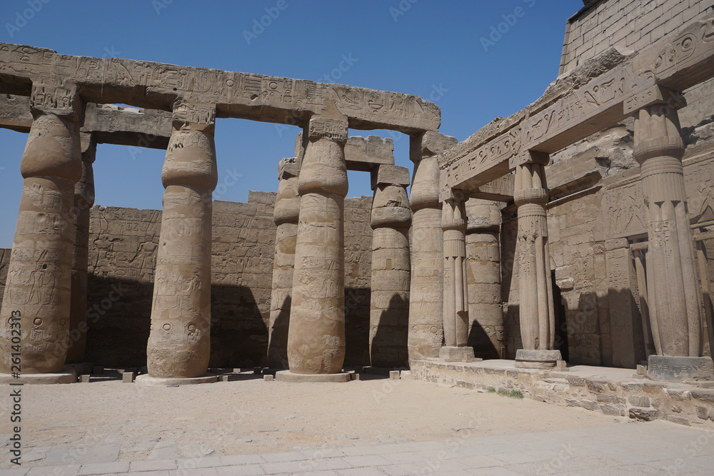Luxor, Egypt: Columns covered with hieroglyphs at Luxor Temple, built in 1400 BC on the east bank of the Nile River.