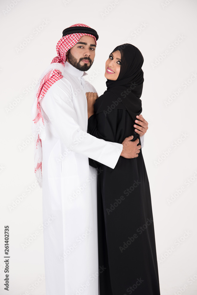 Arab couple standing on white background