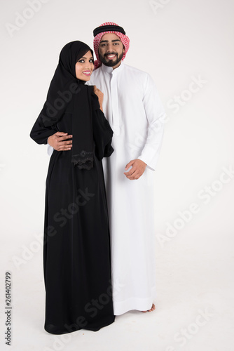 Arab couple standing on white background