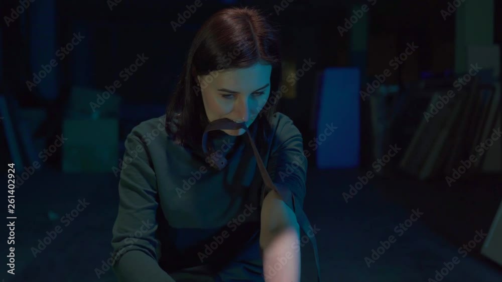Portrait girl is a drug addict injects drugs into a vein
