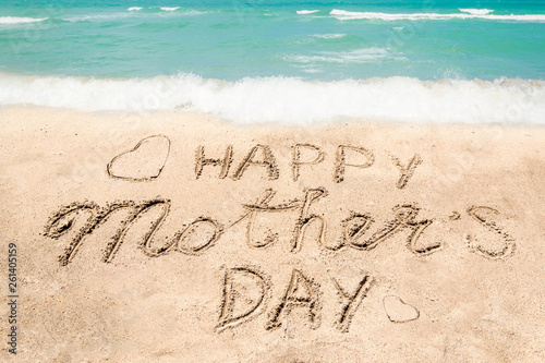 Happy Mothers day beach background with handwritten lettering
