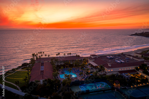 Aerial view over ocean in Dana Point, Orange County in Southern California after sunset during twilight.