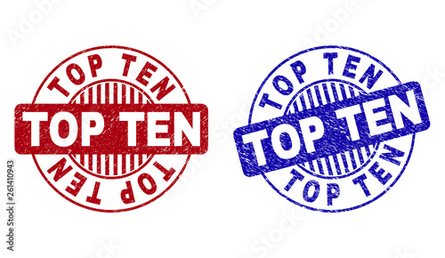 Grunge TOP TEN round stamp seals isolated on a white background. Round seals with distress texture in red and blue colors. Vector rubber imitation of TOP TEN caption inside circle form with stripes.