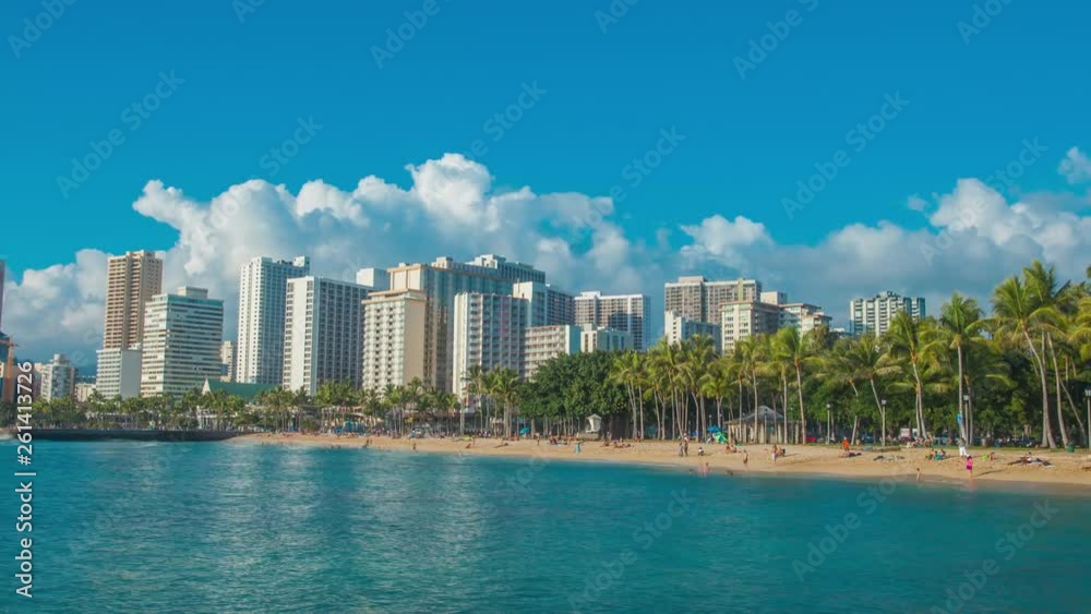4K Cinematic urban time lapse in motion dynamic video view of the beach and hotels in Honolulu Hawaii with dramatic clouds in the background 4K Cinematic urban time lapse in motion dynamic video view of the beach and hotels in Honolulu Hawaii with dramatic clouds in the background