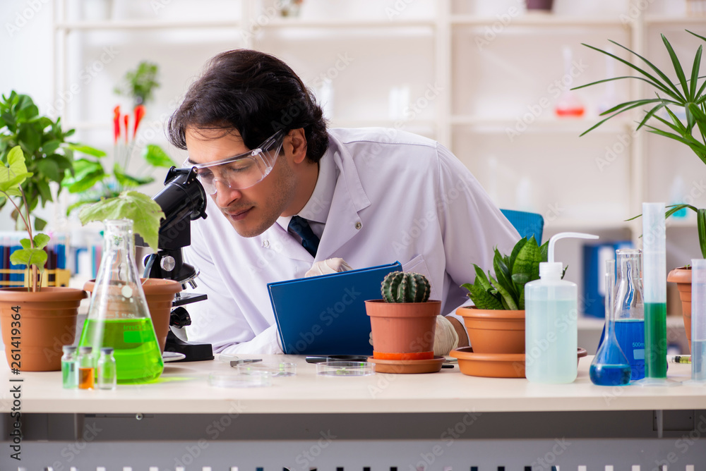 Biotechnology chemist working in lab Biotechnology chemist working in lab