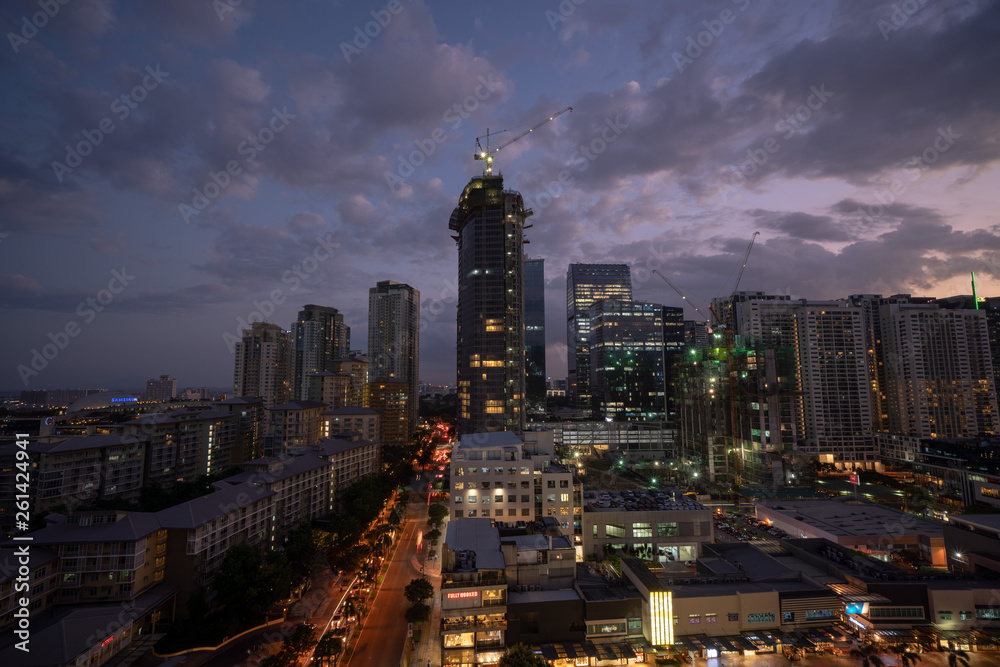 Naklejka premium Bonifacio Global city skyline at Magic hour 