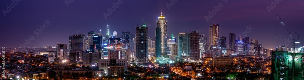 Wide panorama of Bonifacio Global city skyline at Magic hour	