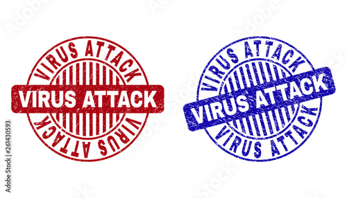 Grunge VIRUS ATTACK round stamp seals isolated on a white background. Round seals with grunge texture in red and blue colors.