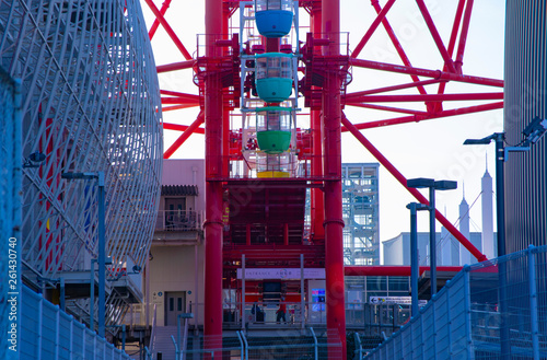 Ferris wheel behind the blue sky at the amusement park in Odaiba Tokyo photo