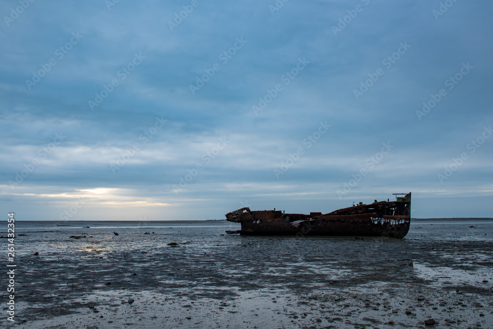 Beached and abandoned rust old ship wreck Beached and abandoned rust old ship wreck