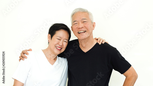 Asian senior couple happy together expression white background
