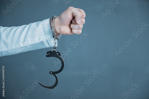 man hand handcuffs