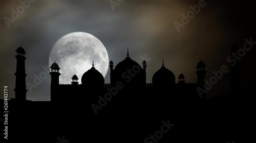 Badshahi Mosque by Night with Full Moon, Historic Landmark in Lahore, Pakistan photo