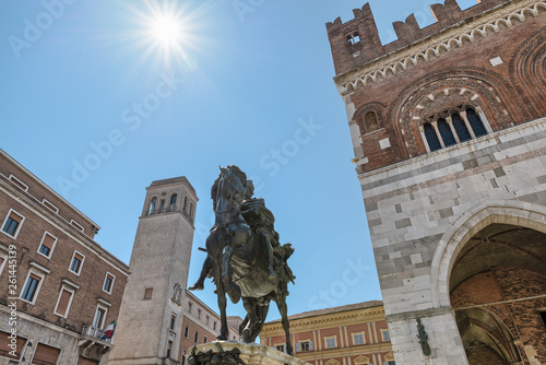 Piacenza, medieval town, Italy. Piazza Cavalli (Square horses) and the monument at Alessandro Farnese (XVII century), to the right the palazzo Gotico (Gothic palace) in the historic city center  © AleMasche72