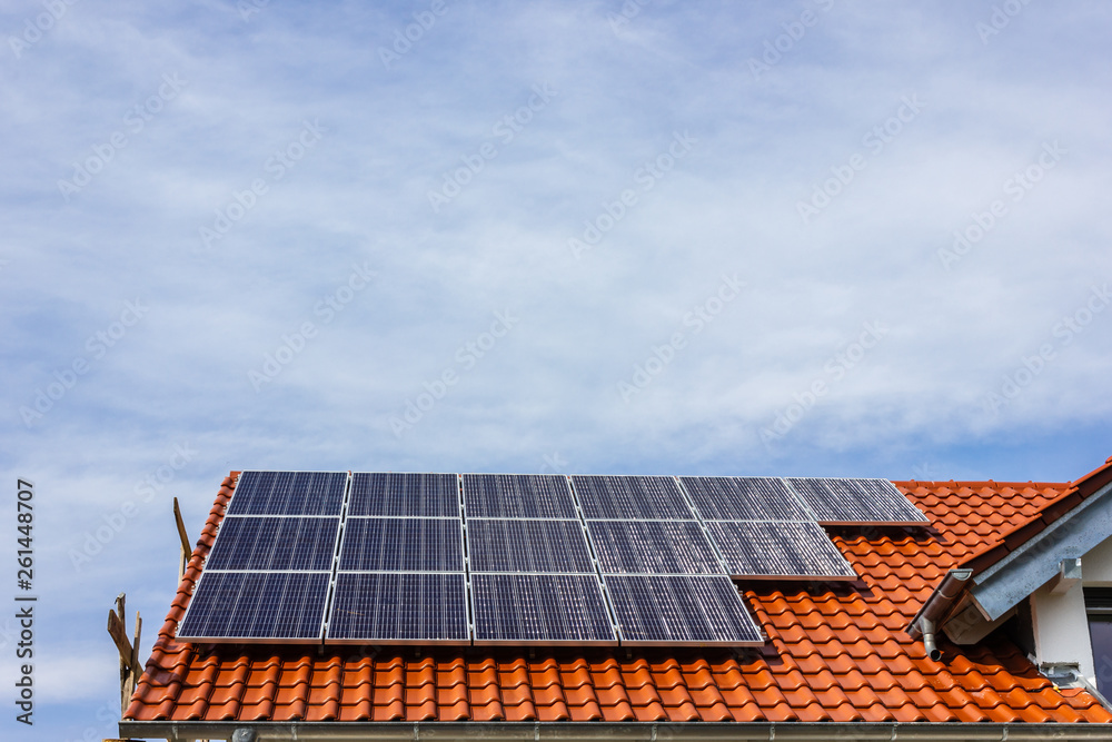 framing house with solar panels on rooftop framing house with solar panels on rooftop