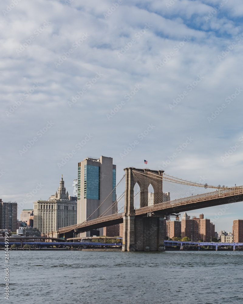 Brooklyn Bridge over East River with skyline of Manhattan, in New York, USA Brooklyn Bridge over East River with skyline of Manhattan, in New York, USA