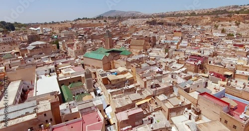 FEZ, MOROCCO. Medieval traditional architecture of the Old Fez. Drone flies above the perimeter of ancient medina.