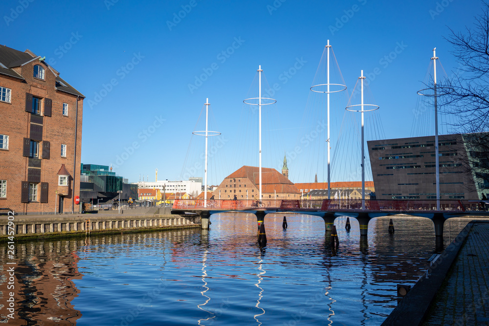 Copenhagen, Denmark - April 1, 2019: Cirkelbroen bridge at Copenhagen on sunny day, with a blue sky Copenhagen, Denmark - April 1, 2019: Cirkelbroen bridge at Copenhagen on sunny day, with a blue sky