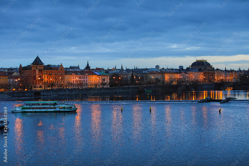 Obraz premium A view of Prague city scape with Charles bridge and Vltava river