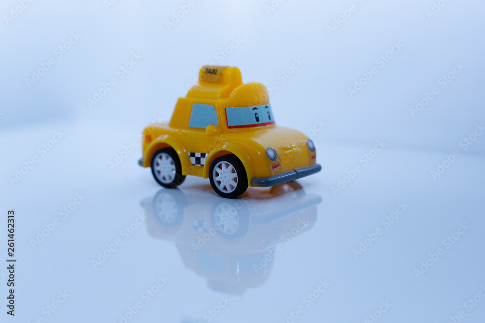 Colorful toy truck with reflection isolated on white background Colorful toy truck with reflection isolated on white background