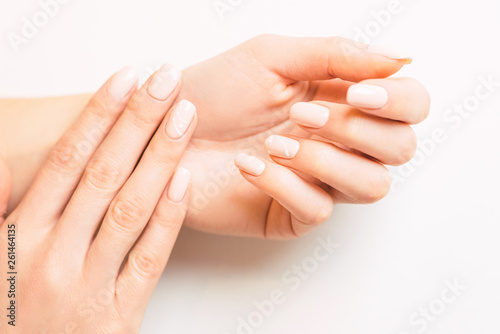 Beautiful female hands with stylish professional manicure.