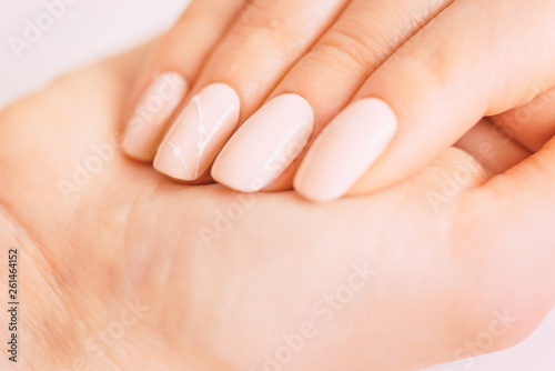 Female hand with professional manicure.