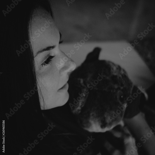 portrait of a woman with a teddy bear