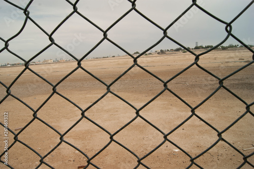 construction mesh. fencing off robbers. net fence in the field in the desert