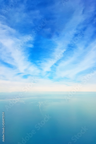 Breathtaking view of the sky and clouds from the window of a flying plane