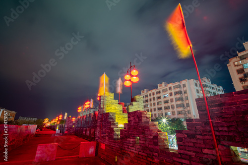 Night view of the Zhaoqing Ancient City Wall with Pi Yun Lou building photo