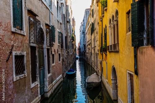 Venice street scene with romantic building canal and gondolas